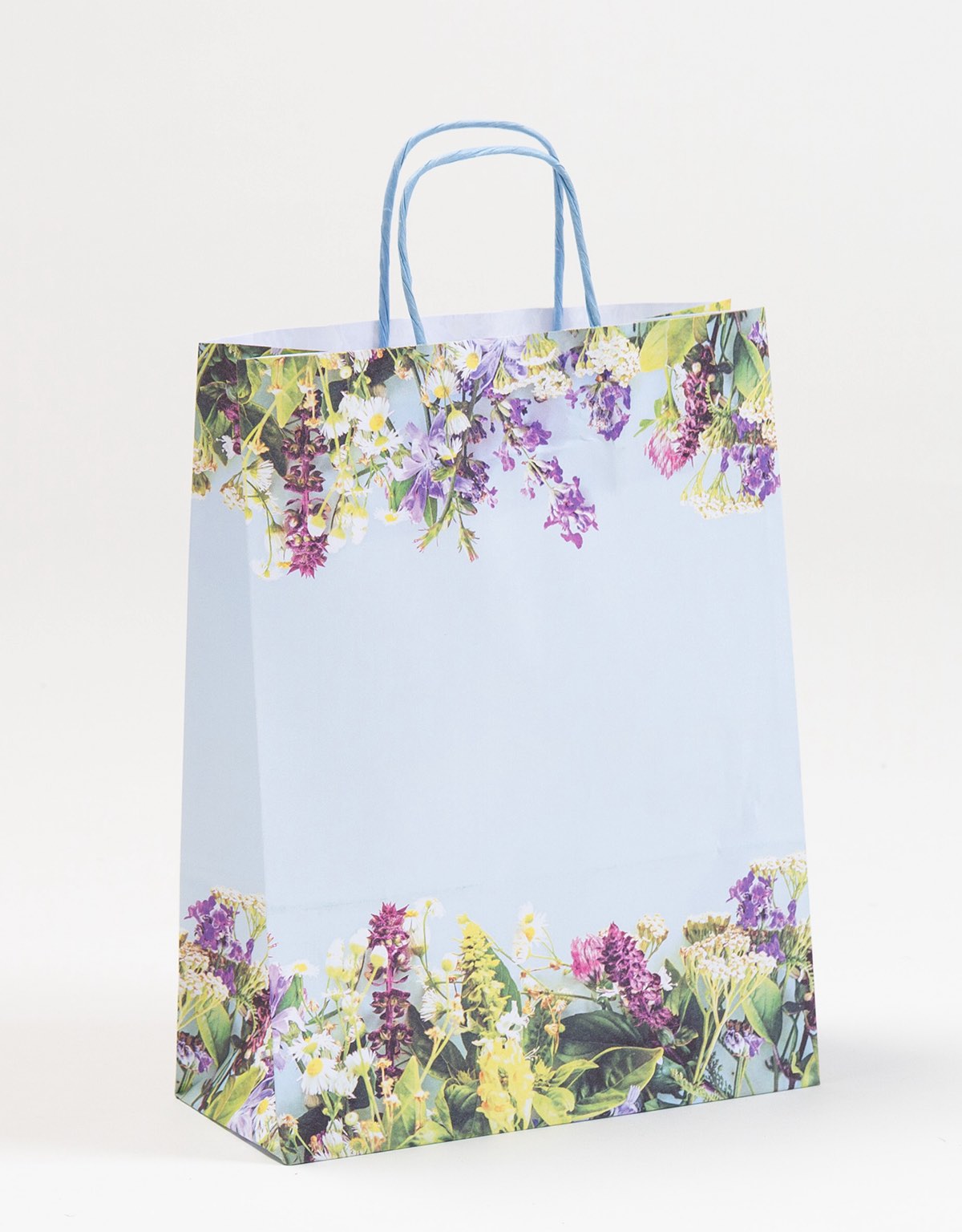Papiertragetasche „Provence“ mit floralem Print in Blau, Freisteller, mit gedrehten Papierkordel-Henkeln