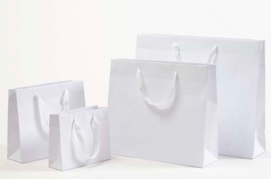 Edle Papiertragetasche mit Stoffbändern in Weiß